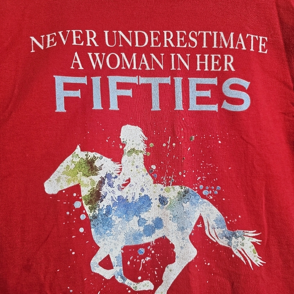 Hanes Red Tee Never Underestimate a Woman in Her 50s Who Can Ride A Horse - Picture 4 of 9